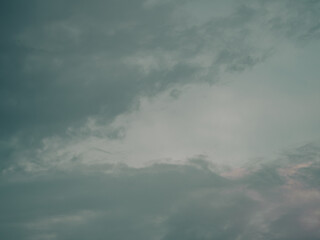 Fototapeta premium Minimalist Grey-Teal Storm Clouds Filling Expansive Moody Sky