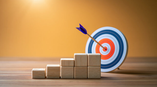 Wooden block target arrow business growth measurable objective
