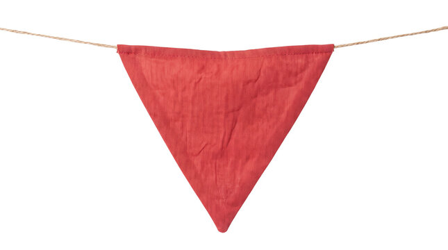 Red linen bunting flag on twine string, rustic fabric pennant banner, festive triangle garland decoration on white background