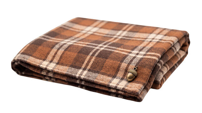 Rustic brown plaid blanket with acorn pin, folded wool tartan throw for autumn home decor, cozy checkered textile on white background