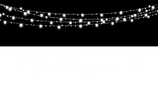 Glowing string lights hanging against a dark background