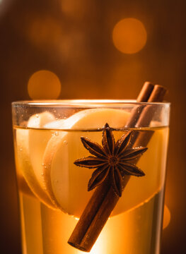 Hot apple cider with cinnamon and star anise garnish