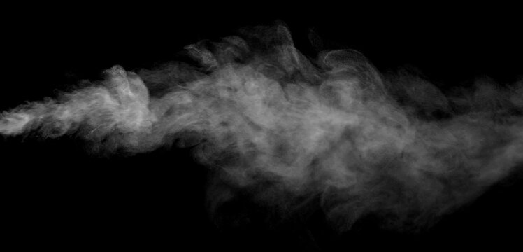 Gray smoke and dust cloud isolated on a black background, forming a soft atmospheric plume with swirling texture, flowing motion, and dramatic depth for cinematic effects and creative designs.