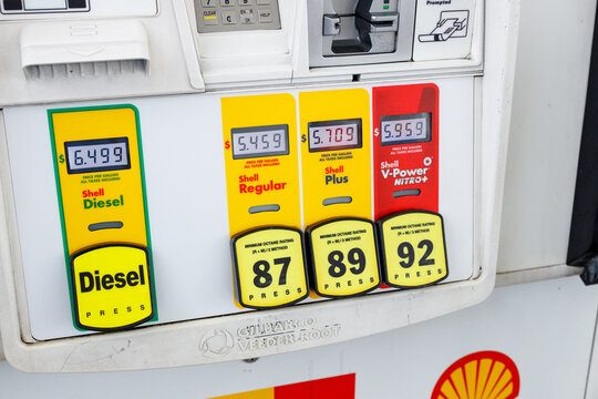 A Shell fuel pump display shows expensive prices, diesel at 6.499, regular at 5.459, plus at 5.709 and V Power Nitro at 5.959 dollars a gallon.