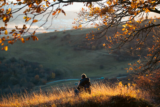Woman enjoying autumn nature