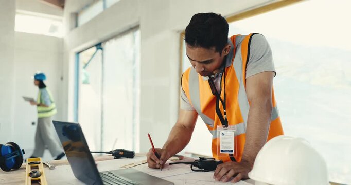 Man, drawing and blueprint at construction site for engineering design, home renovation and building. Engineer, person and floor plan illustration in house for remodeling project, layout and review.
