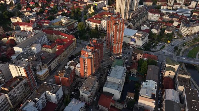 Uzice, Serbia. Drone Shot of Cityscape, Downtown Buildings on Summer Sunset