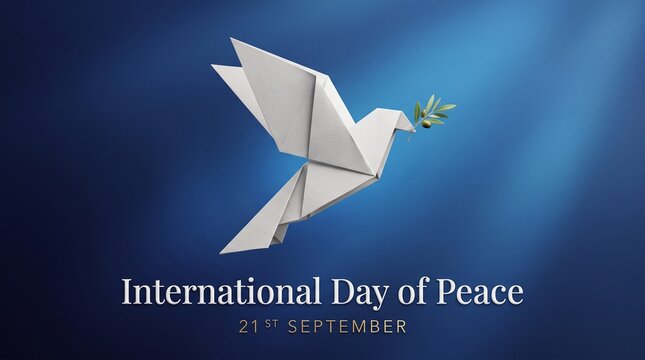International Day of Peace Concept with White Origami Paper Dove Carrying an Olive Branch on Blue Background