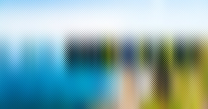 Abstract texture featuring a smooth transition from cool blue tones to warm vibrant golden light