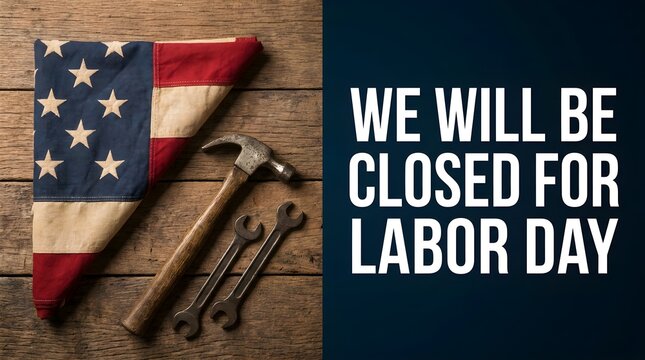 Labor day holiday closure sign with a folded american flag, a hammer, and two wrenches on a rustic wooden background, flat lay composition
