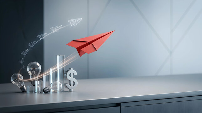 Red paper airplane flying upward from glass bar charts, light bulbs, and a dollar sign on a desk, symbolizing business growth, creative innovation, financial success, and startup vision.