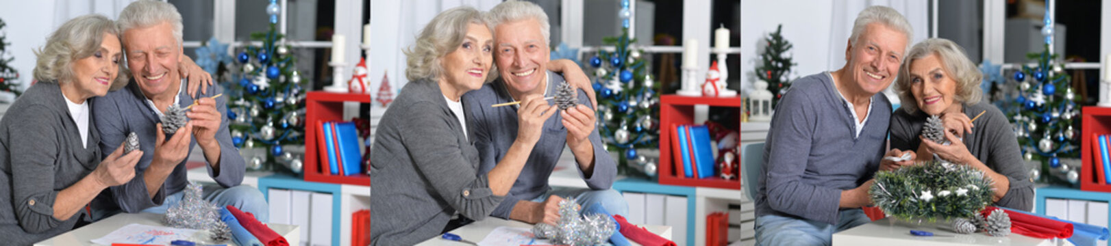 Senior couple celebrating Christmas at home with gifts and decorations