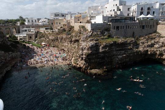aerial view of lama monachile beach in polignano a mare, apulia, italy