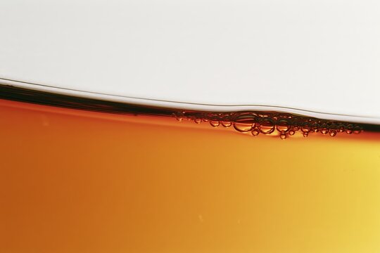 Close-up of a glass of red wine with bubbles and rich color