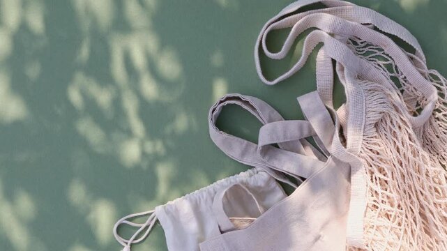 Reusable and eco friendly tote bags from recycled materials for zero waste grocery shopping and sustainable lifestyle in harmony with the environment.