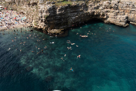 aerial view of lama monachile beach in polignano a mare, apulia, italy