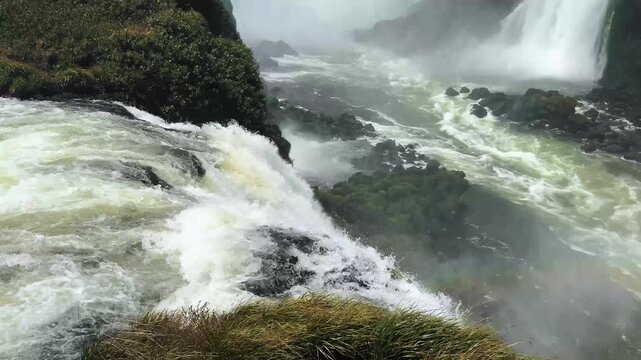 Iguazu Falls on the Argentina-Brazil border, one of the world&rsquo;s largest waterfall systems with 275 cascades surrounded by lush subtropical rainforest in Iguazu National Park.