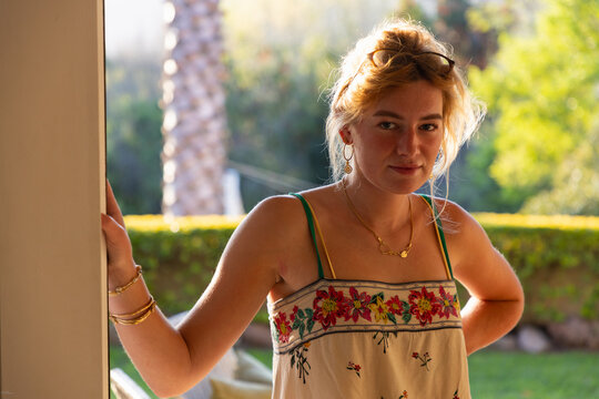 portrait of beautiful young woman backlit with sunset light