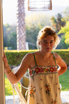 portrait of beautiful young woman backlit with sunset light