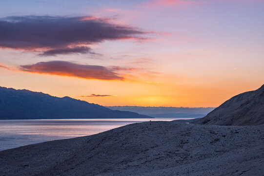Incredible sunrise colors captured from Paska Vrata, located on Pag Island, Croatia