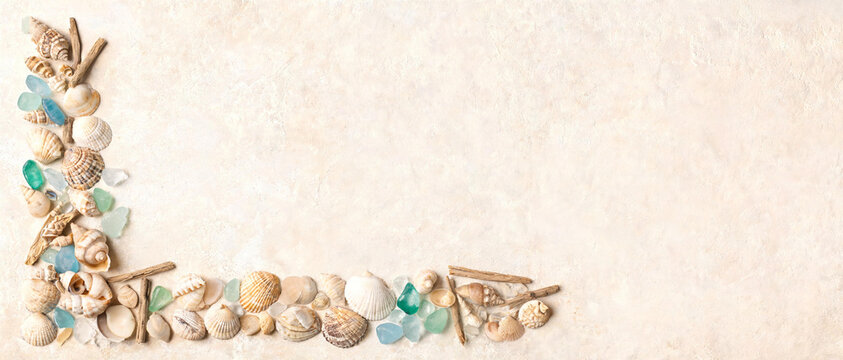 Seashell frame border on neutral background, Coastal beach seashells sea glass flat lay, Summer ocean shells background with copy space, Marine seashell frame layout, Natural beach border background.