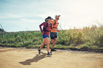 Outdoor, travel and happy couple with backpack, running and exercise routine with partner or...