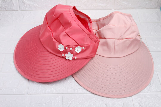 pink hat on a white background