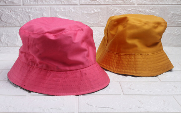hats on a white table