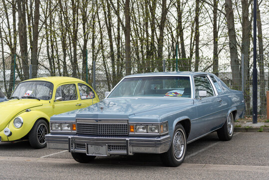 Nancy, France - April 7th 2019 : View on a blue Cadillac DeVille parked on a parking lot.