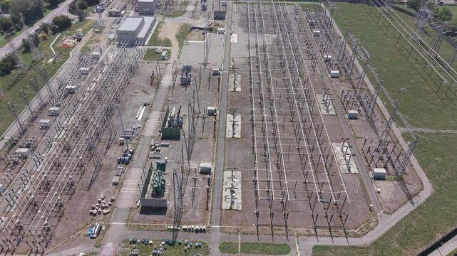 Aerial view of the Terna Baggio substation in Settimo Milanese, highlighting transformers, metal transmission towers, electrical equipment and interconnected power infrastructure.