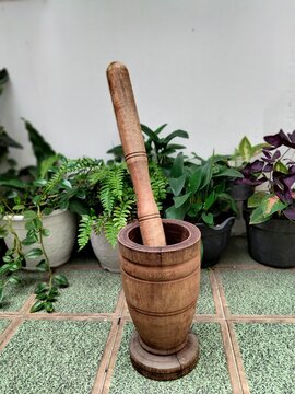 mortar and pestle with herbs