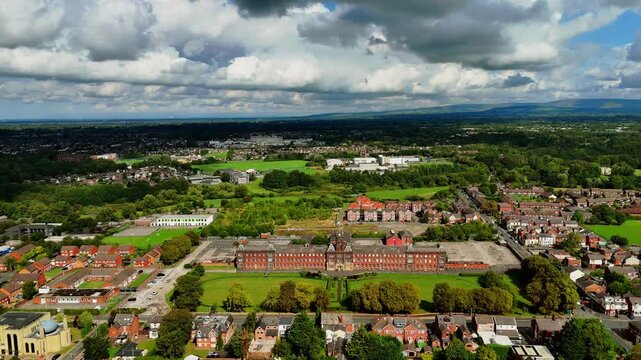 Aerial pull back shot of Fulwood Business Centre and town in Preston, England