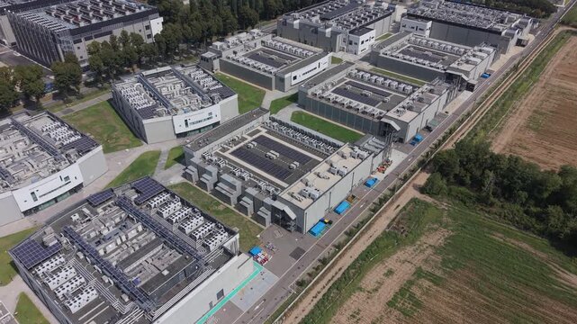 Aerial view of the DATA4 Milan Campus, showing data center infrastructure and large-scale cooling systems supporting modern computing and AI-related digital operation