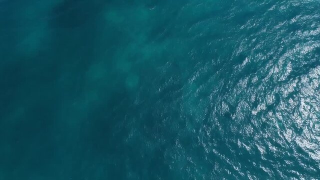 Aerial ocean water texture slowly moving, cinematic nature background