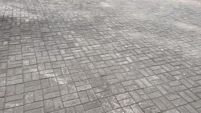 Paving stones walkway surface texture for outdoor landscaping concept