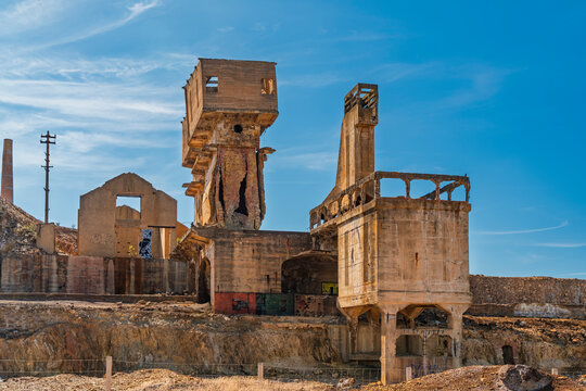 The abandoned historic mine ruin stands outdoors in Sao Domingos