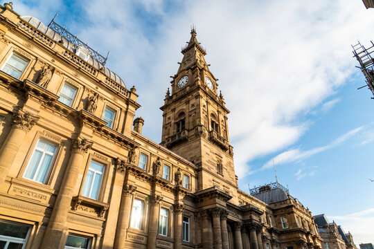 Low angle view of the Municipal Hotel in Liverpool against a blue sky