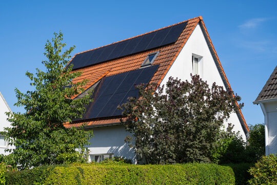 Old dwelling with solar panel on the roof in Soest Germany