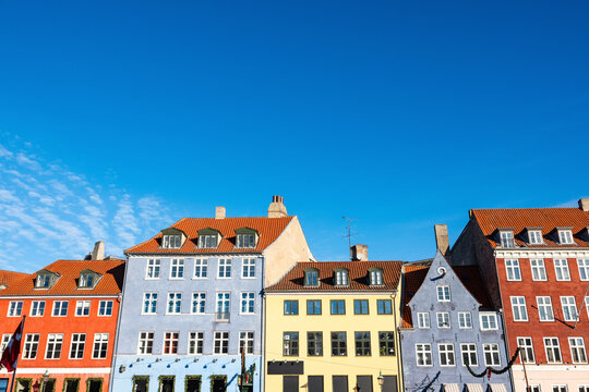 Colorful houses line the street of Nyhavn in Copenhagen