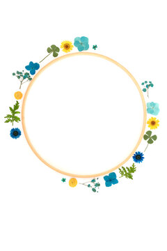 Dried pressed flower leaf abstract wreath garland on white background. Wooden frame decoration design for greeting card, logo, invitation.
