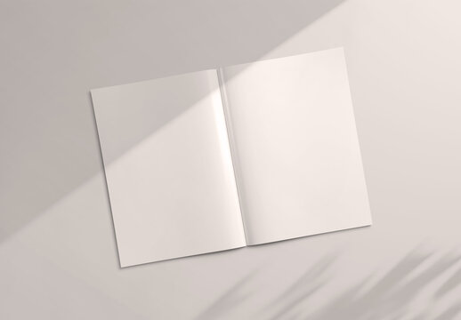 Open magazine Mockup on white background with soft shadows. 3D rendering