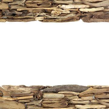 Driftwood art rustic weathered wood design background border frame on white. Seaside reclaimed natural beach wooden pieces. Coastal decor decoration.