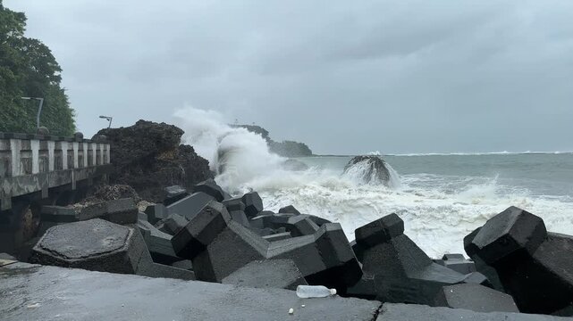 Hurricane Storm Surge Waves Crash Into Coastal Sea Defenses 