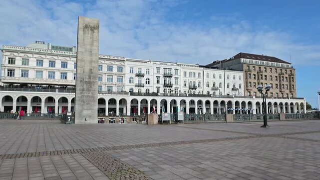 Slow pan of historic buildings with colonnades in Hamburg