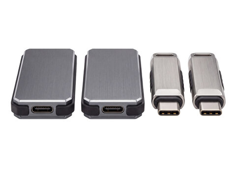 External SSD USB C Drive high speed portable flash drive storage set for data transfer and memory backup, sleek metal hardware isolated on black background for modern digital technology concepts.