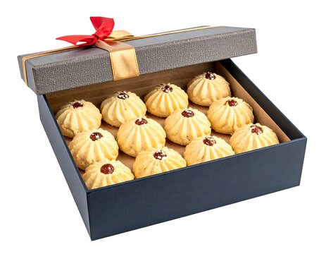 Luxury gift box of butter swirl cookies topped with chocolate and nuts isolated on white background
