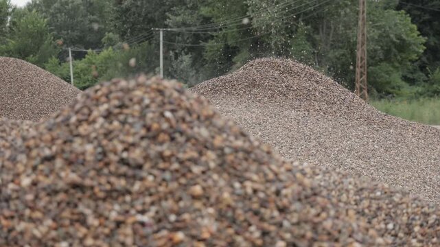 Falling gravel piling up at construction site