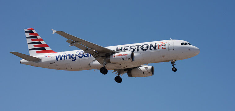 Tenerife, Spain September 6st, 2026. Airbus A320-232 Heston Airlines flies in the blue sky. Landing at Tenerife Airport