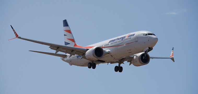 Tenerife, Spain September 6st, 2026. Boeing 737 MAX 8 Smartwings (Tenerife Awakens Emotions Stickers) Airlines flies in the blue sky. Landing at Tenerife Airport