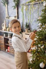 Obraz premium Happy child on Christmas, enjoying some quality time, opening presents, kids on Christmas eve in decorated home
